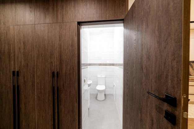 Interior design of a house with a wall made of natural wood