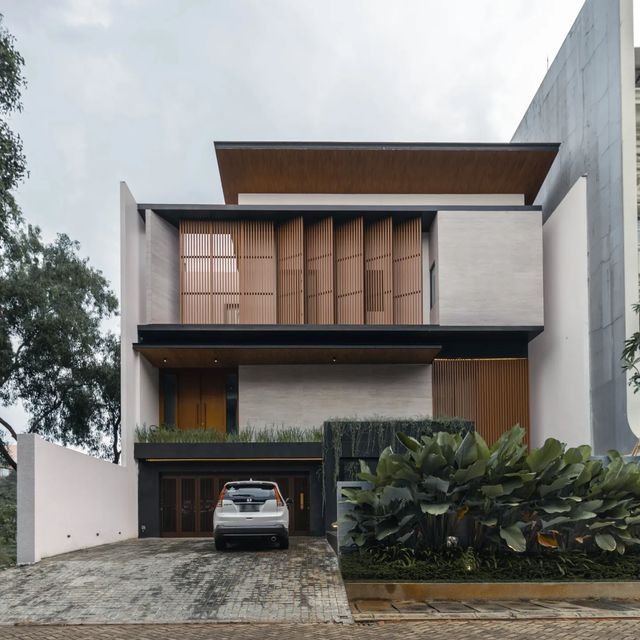 Fasad rumah minimalis dengan garasi