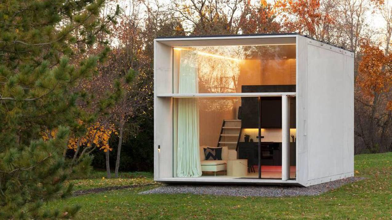 Desain rumah kombinasi kaca dan triplek